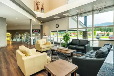 a lobby with couches and chairs in a store at Quality Inn & Suites in Clearwater