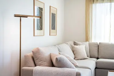 a living room with a couch and a window at Sea Eagles Landing by Revelstoke Vacations in Revelstoke