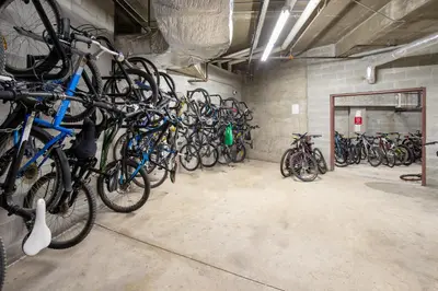 a bunch of bikes parked in a garage at The Maple Ski-in Ski-out 1 Bed with Hot Tub and Pool in Whistler