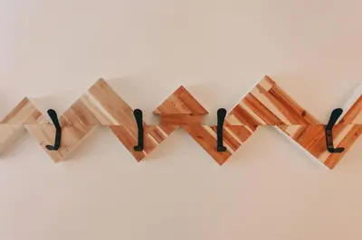 a group of wooden letters hanging on a wall at The Fjall Ski-In Ski-Out Village Studio in Big White