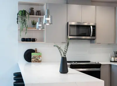 a kitchen with a vase sitting on a counter at Ghost Peak by Revelstoke Vacations in Revelstoke