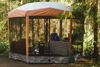 a gazebo in the middle of a forest at Smith Lake Farm in Merville