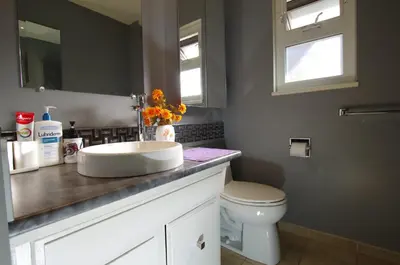 a bathroom with a sink and a toilet at New Master room & private washroom 203 in Richmond
