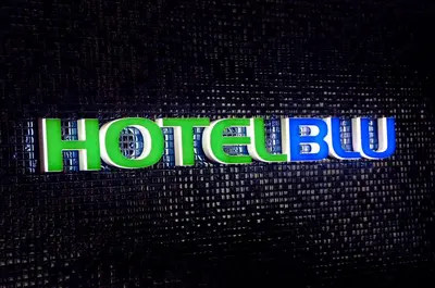a sign that says hulu on a wall at Hotel BLU in Vancouver