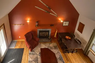 an overhead view of a living room with a fireplace at Timbers Resort in Fairmont Hot Springs