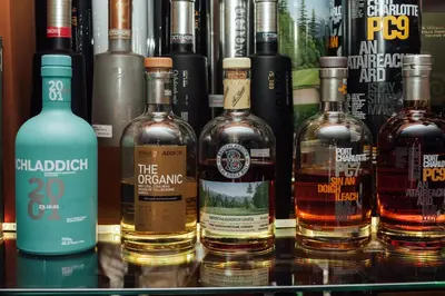 a bunch of bottles of alcohol on a shelf at The Grand Hotel Nanaimo in Nanaimo