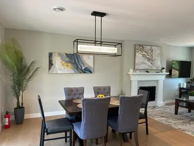 a dining room with a table and chairs at Blue Sea And Clear Sky B&B LICENCE NUMBER 18952 in Victoria