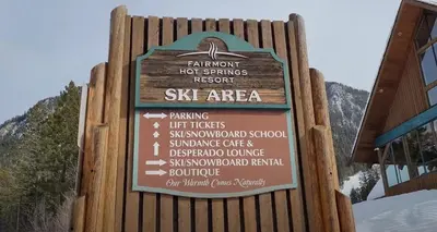 a sign for the ski area at a ski lodge at Mountain View Vacation Villa Main Floor Unit, No Stairs in Fairmont Hot Springs