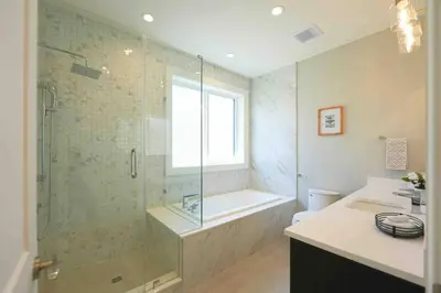 a bathroom with a shower and a tub and a sink at Four bedrooms New Lovely Duplex -1626 in Vancouver