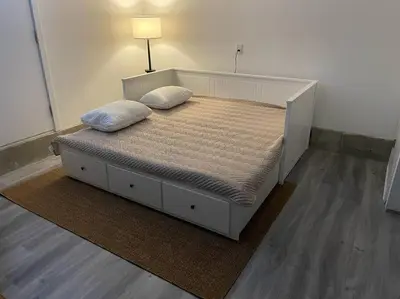 a bed with two pillows on it in a room at Stunning 5-bed Retreat in Sunshine Valley in Sunshine Valley