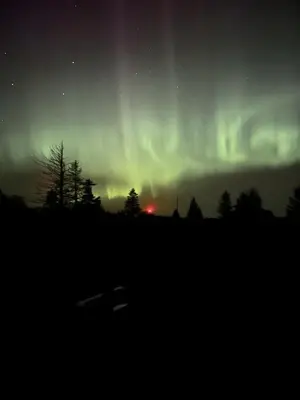 an image of the northern lights in the sky at Sunrise Cabin- The Loft - secluded Beach front guest house in Sandspit