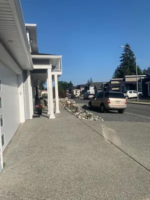 a car parked in front of a house at Entire 2BR Guest House in Quiet Area in Nanaimo