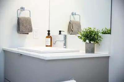 a bathroom with a sink and a mirror at Revy Mountain Retreat in Revelstoke