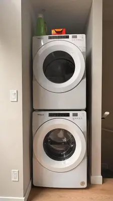 a white washer and dryer in a room at Immersed in the scenery of Canmore in Canmore