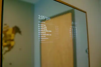a computer screen with a door in the background at Bright Modern Stylish Condo in heart of Downtown (Center) in Whitehorse