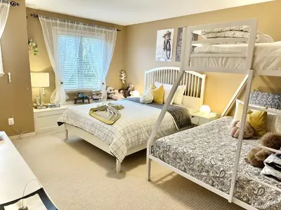 a bedroom with a bunk bed with a ladder at Scorpio House Langley -ROOM 2 in Langley
