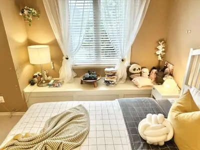 a bedroom with stuffed animals sitting on a window sill at Scorpio House Langley -ROOM 2 in Langley