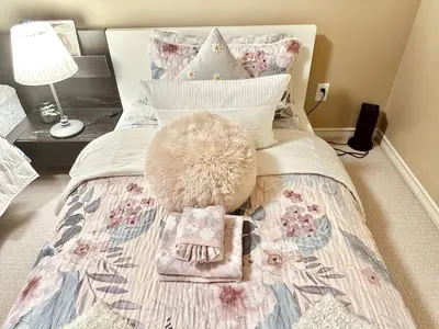 a bedroom with a bed with a teddy bear on it at Scorpio House Langley -ROOM A in Langley