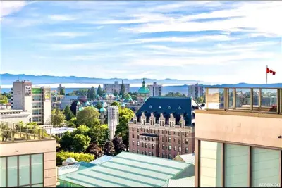 a view of a city from a building at Waterfalls Hotel in Downtown With Stunning Views! in Victoria