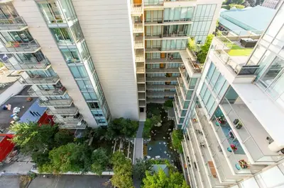 an aerial view of an apartment complex with buildings at Waterfalls Hotel in Downtown With Stunning Views! in Victoria