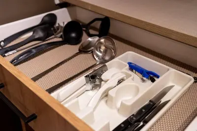 a drawer with a kitchen utensils in it at Mountain view walk to all in Canmore Canada in Canmore