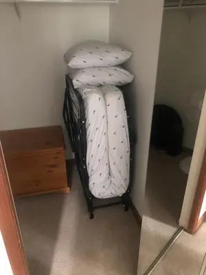 a bunk bed in a corner of a room at Desirable Blueberry Hill in Whistler
