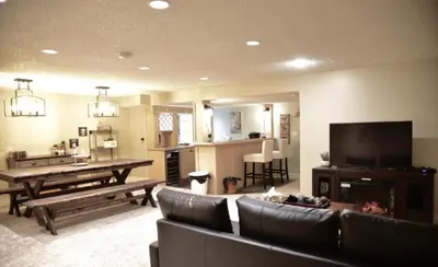 a living room with a couch and a table at OFF CAMPUS UC Room in Calgary