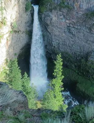 a waterfall in the middle of a river at Woodcrest Bed and Breakfast in Clearwater
