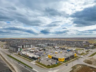 an aerial view of a city with a highway at Sunny Walk-out Unit, Free HiSpeed Wi-Fi and Parking, Near Grocery in Calgary