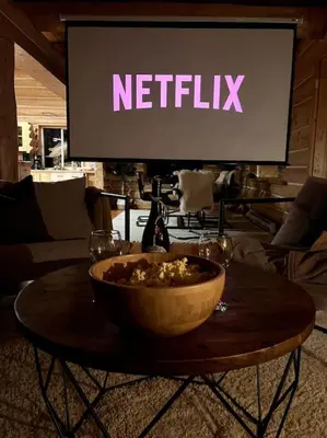a bowl of food on a table in front of a sign at Golden Cabin - Hot Tub - Games Barn - Theatre in Golden