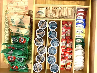 a refrigerator filled with lots of different types of food at Brand New 2BR Condo with Outdoor Swimming Pool and Hot Tub in Canmore
