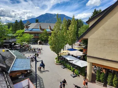 an overhead view of a street in a town with people at The Ikon Lofted Studio with King Bed and Patio in Whistler