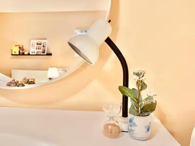 a white lamp on a white table with a plant at Scorpio House Langley ROOM B in Langley
