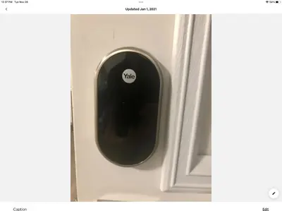 a black door handle on a white door at Homelike & cozy suite in Langley