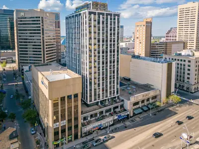 an aerial view of a city with tall buildings at 2 Full Beds, Free Parking Underground Heated, Rogers Place, 1 Bedroom Condo Downtown Central in Edmonton