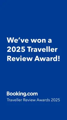 a blue sign that says weve won a traveler review award at Lovely comfy home private bath in central Calgary in Calgary
