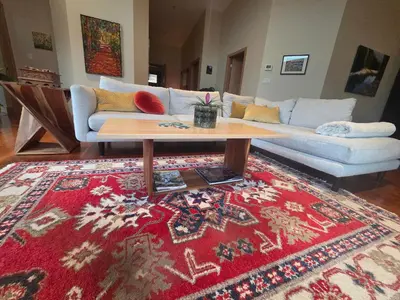 a living room with a couch and a coffee table at Five Star-Amazing views and Hot Tub in Crescent Valley