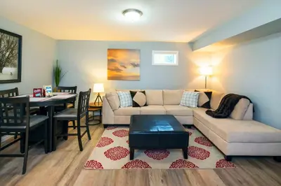 a living room with a couch and a table at NN - The Mack - Crestview 1-bed 1-bath in Whitehorse
