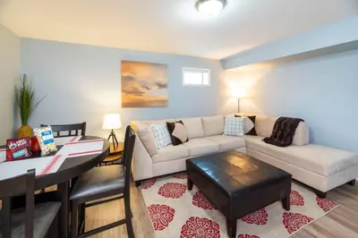 a living room with a couch and a table at NN - The Mack - Crestview 1-bed 1-bath in Whitehorse