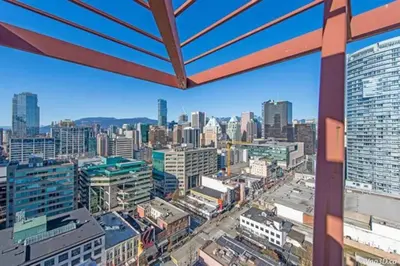 a view of a city from a building at Modern top-floor 1-bedroom loft with free parking in Vancouver