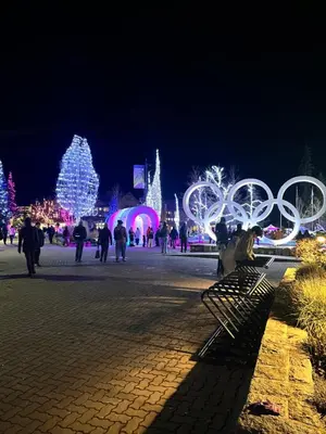 a city lit up with christmas lights at night at Cascade Lodge with front desk check in services, ski valet service, boot and glove dryer, 2 hot tubs, year round heated pool, gym, sauna, change rooms & showers, WIFI, cable TV in Whistler