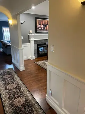 a living room with a fireplace and a tv at Character Stay across Swan Lake Nature Sanctuary in Victoria