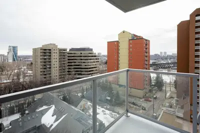 a view of a city from a balcony at Hendrix Luxury Apartments by Corporate Stays in Edmonton