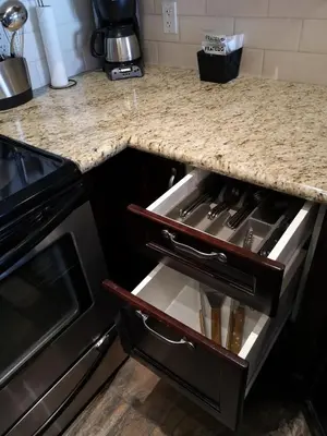 a kitchen with a counter top with a stove top oven at Sweet Condo Canmore GR\uff1a\uff09 in Canmore