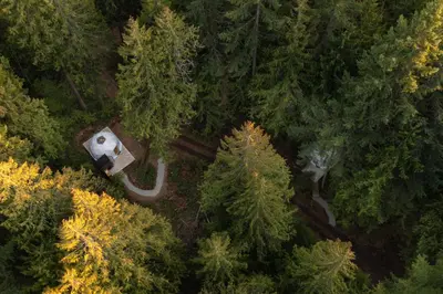 an overhead view of a house in the middle of a forest at Stay Wilder Sunshine Coast in Sechelt