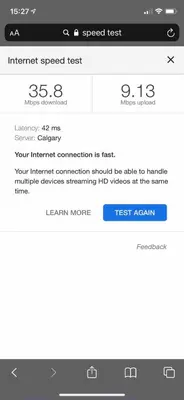 a screenshot of the internet speed test screen on a phone at Mountain View 3br Loft Walk To Dt king fireplace in Canmore