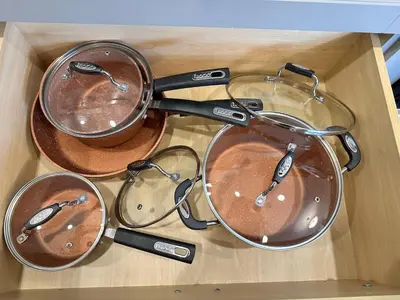 a wooden box with three cymbals and pans at Mountain Retreat Corner Suite -Pool - Hot Tub & Spa Escape in Canmore