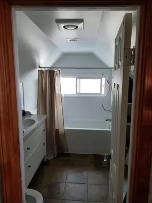 a bathroom with a tub and a sink and a shower at Bon Homme View in Jasper