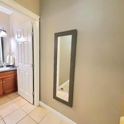 a bathroom with a mirror on the wall at Spacious 2BR Near HWY 1-Heritage Park - Cultus Lake -Fishing! in Chilliwack