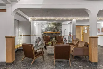 a living room with a couch and chairs at W411 NEW- TOP of the World Canmore MTN Retreat in Canmore